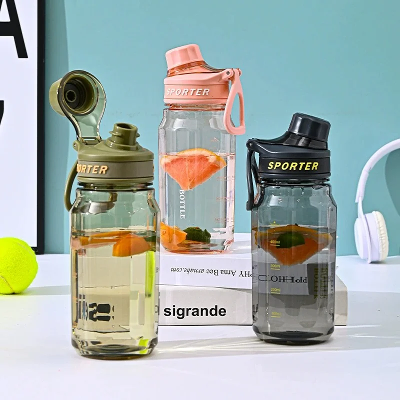 Botellas deportivas transparentes con tapa abatible y pajita